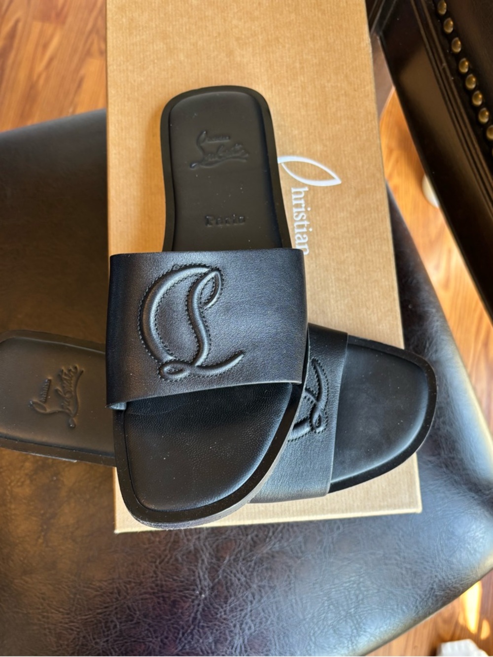 Christian Louboutin Black Leather Slide Sandals with Embossed Logo - Picture 2 of 6